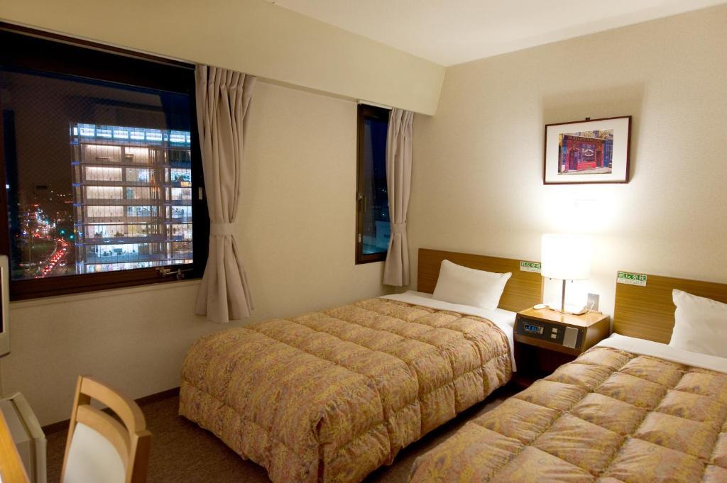 Hotel Keifuku Fukui Ekimae Quarto foto